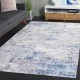 thumbnail image 3 of SAFAVIEH Santa Monica Otis Abstract Polyester Area Rug, Ivory/Blue, 6' x 9', 3 of 13