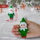 thumbnail image 4 of LitoMagic Muñeco Duende Bebé Navideño con Mono Verde, 4 of 5
