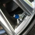 thumbnail image 2 of Paw Print Dog Cat White on Black Tire Rim Wheel Aluminum Valve Stem Caps - Blue, 2 of 3