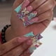 thumbnail image 1 of Uñas postizas largas con punta francesa, cuadradas azules, con diseño de mariposa 3D dorada, juego de 24 piezas., 1 of 5