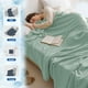 thumbnail image 4 of Manta refrescante de mezcla de algodón y rayón para quienes duermen con calor, transpirable y ligera, con regulación de temperatura para cama o sofá. Aestivo | Verde claro | AESTIVO, 4 of 7