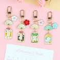 thumbnail image 4 of Creative Small Gift Golden Gifts Skinny Ginseng Keychain Alloy Oil Dropping Cherry Blossom Bag Pendant for Women - style：a5043-4；, 4 of 6