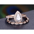 thumbnail image 4 of 2 Carat Pear cut Man made diamond moissanite and Man made diamond moissanite Bridal Set with 18k Gold Plating, 4 of 6