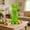 Green, variant on Surpdew Easter Decorations Flocked Bunnies Figurine With Bow Tie 8.8" Flocking Rabbit Tabletop Ornament For Easter Centerpieces For Spring Home Office Table Decor, Party Supplies Green 8.7Inch