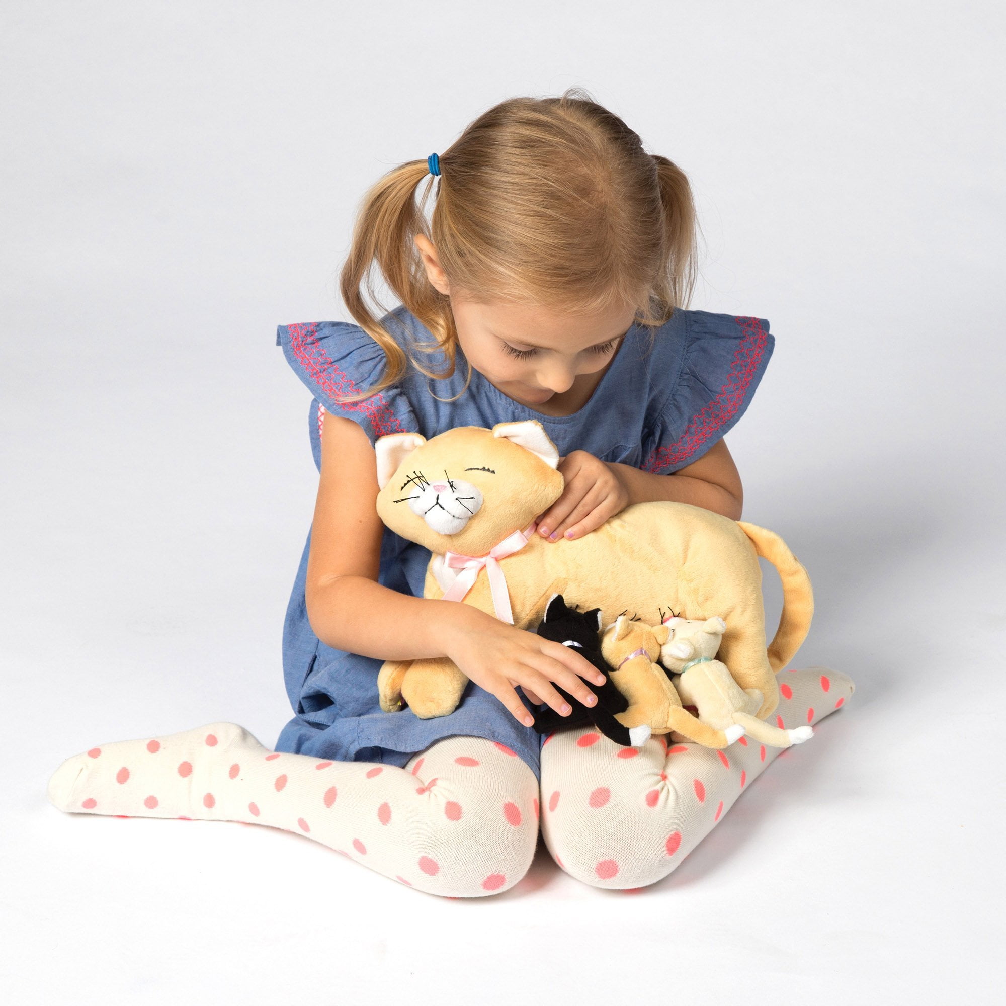 manhattan toy nursing cat