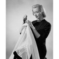 thumbnail image 2 of Studio shot of young woman sewing Poster Print (18 x 24), 2 of 4