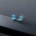 thumbnail image 4 of Gem Stone King 14k White Gold Swiss Blue Topaz and Blue Created Sapphire Earrings for Women (2.76Cttw, GemstoneNovember Birthstone, Oval Checkerboard 8X6MM, Round 2.5MM), 4 of 5