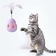 thumbnail image 1 of Juguete dispensador de golosinas para gatos con pluma, interactivo, evita que se vuelque, alimentador lento para gatos, bola de rompecabezas, rosa y morado, 1 of 10