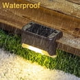 thumbnail image 4 of Paquete de 4 luces solares para terraza FloreceBien para exteriores, iluminación LED impermeable negra para escalones, patios y caminos, 4 of 5