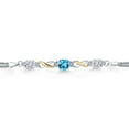 thumbnail image 2 of 925 Silver and 10K Yellow Gold Swiss Blue Topaz and White Moissanite and White Lab Grown Diamond Bracelet for Women (2.50 Cttw, Gemstone November Birthstone, Cushion 6MM, 7.5 inches, Made in Italy), 2 of 4