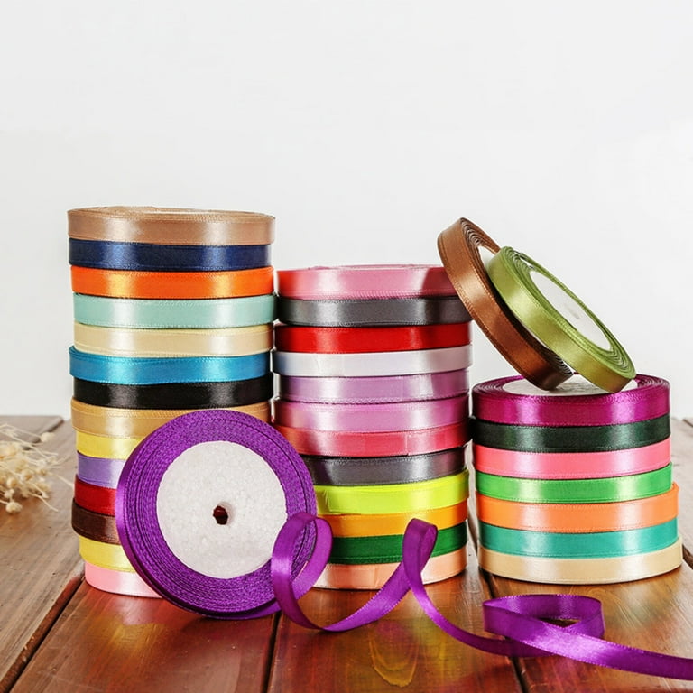 How to ribbon wrap a round, wedding gift box and add a Bowdabra bow