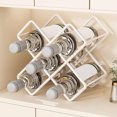 thumbnail image 1 of Estante decorativo de hierro para vinos, liquidación navideña. Elegante organizador de vino para encimera con diseño de bendición, con capacidad para varias botellas, blanco, negro y dorado, 25 x 25, 1 of 6