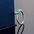 thumbnail image 3 of Gem Stone King 10K White Gold Blue Zircon Solitaire Engagement Ring for Women (1.20 Cttw, Oval 7X5MM, Gemstone Birthstone, Size 7.5), 3 of 3