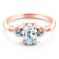 thumbnail image 2 of Gem Stone King 18K Rose Gold Plated Silver Sky Blue Aquamarine and Swiss Blue Topaz 3-Stone Rings for Women (1.26 Cttw, Gemstone March Birthstone, Oval 8X6MM, Size 5), 2 of 4