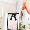 thumbnail image 3 of 20 Bolsas de Regalo de Plástico Transparente con Asas Troqueladas, Reutilizables, con Flores y Lazo Negro., 3 of 5