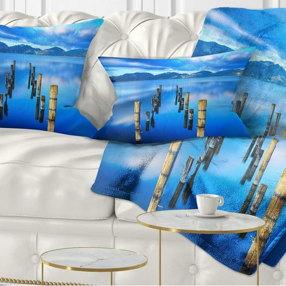 Designart Wooden Pier Remains in Blue Sea - Seascape Throw Pillow - 12x20