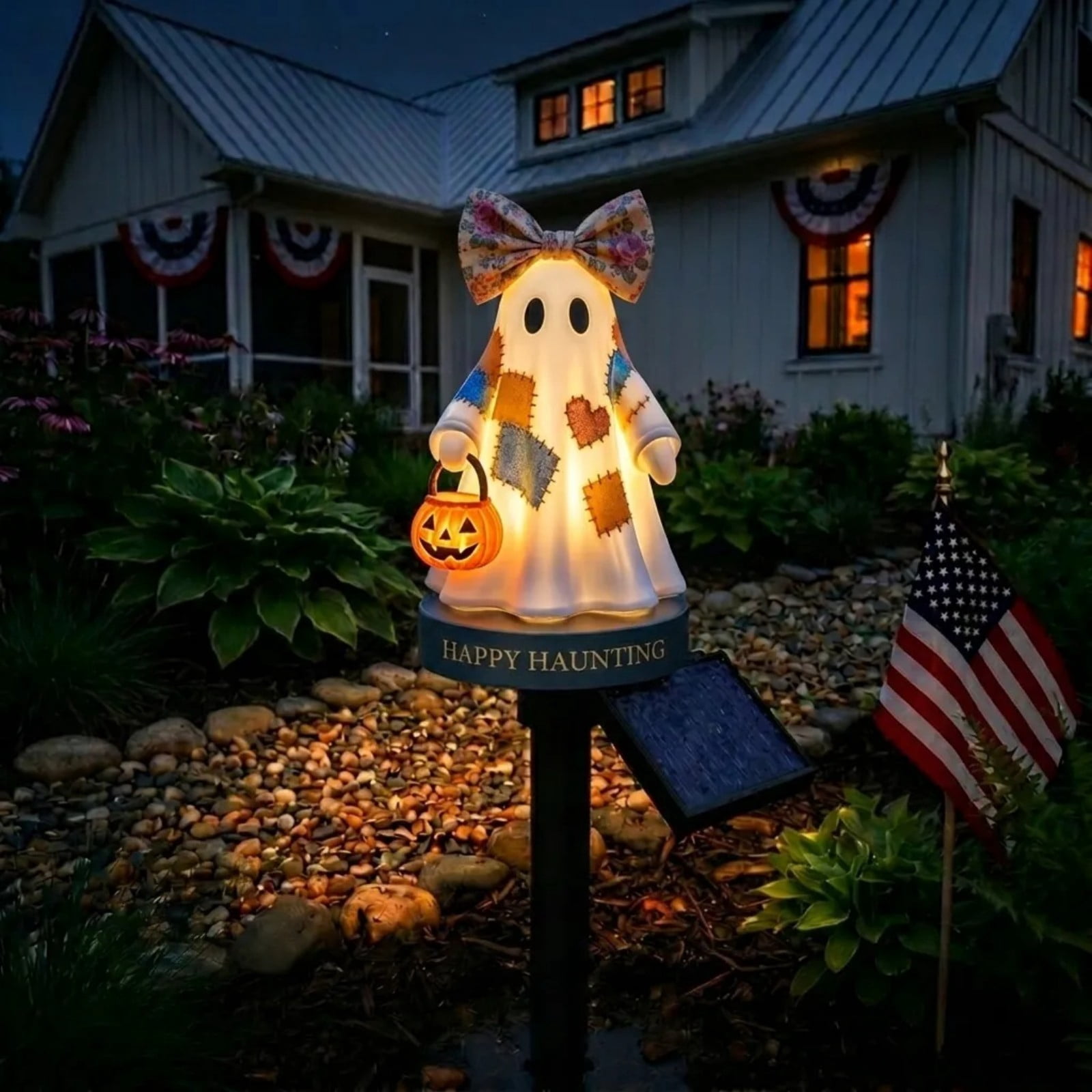 Close view of the glowing ghost garden light and decorative details