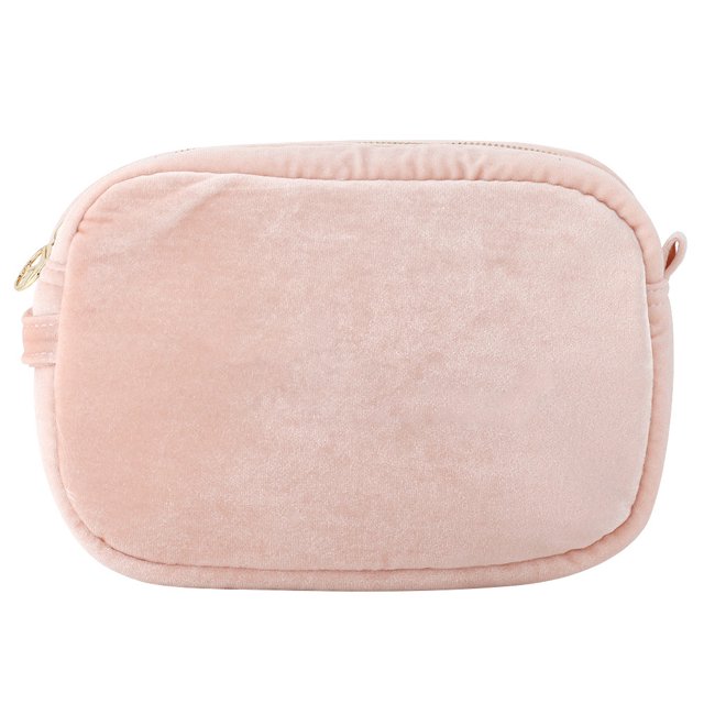 Organizador de cosméticos compacto en color rosa para artículos de belleza esenciales para llevar en cualquier lugar. Bolsa de maquillaje portátil para viajes