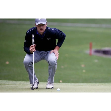 Jordan Spieth lining up putt on golf course 24x36 Poster