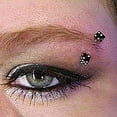 thumbnail image 2 of Surgical Steel Eyebrow Ring Curved Barbell 16 Gauge With Acrylic Dice, 2 of 4