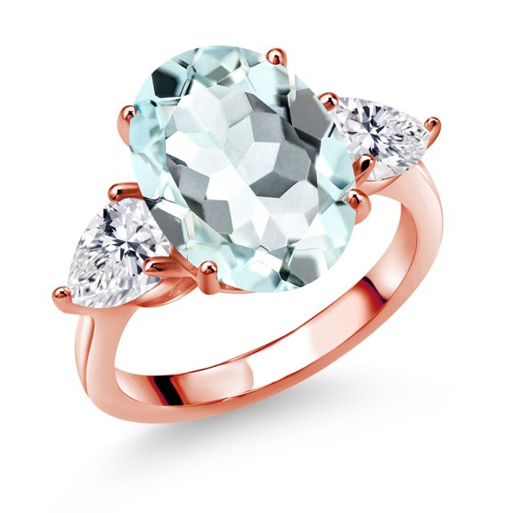 Gem Stone King 18K Rose Gold Plated Silver Sky Blue Simulated Aquamarine and Lab Grown Diamond Engagement Ring for Women | 6.74 Cttw | Oval 14X10MM | Gemstone March Birthstone | Size 9