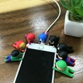 thumbnail image 3 of Mini Plastic Phone Holders, Superhero Cable Protector, Desk Accessories, Electronics Organizer, No Batteries Needed, Featherless, Multipack, 3 of 5