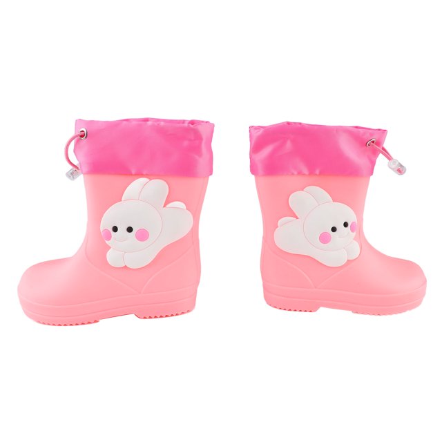 botas de lluvia botas de lluvia para niños antideslizantes impermeables ajustables a la moda para días lluviosos para alumnos Par de botas de lluvia infantiles en rosa con puño elástico ajustable y cordón de cierre, PVC visible, suela antideslizante texturizada cóncava-convexa y aplique de conejo blanco; vista frontal y lateral sobre fondo blanco, tamaño aprox. 18 x 16 x 7 cm. Su tamaño compacto suele usarse también para llevar en la mochila escolar en días lluviosos.