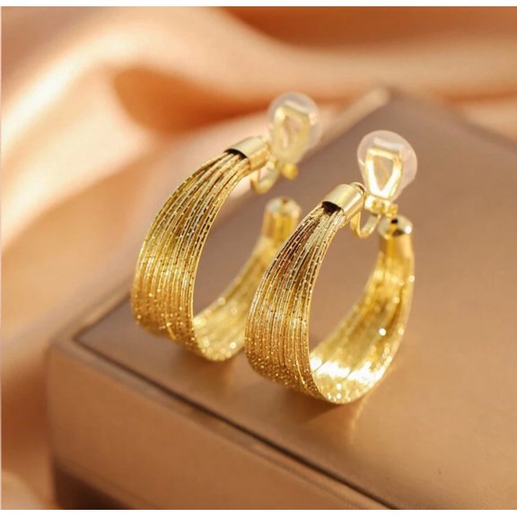 Clip on 1 1/2" sparkle gold wire graduated open back hoop earrings