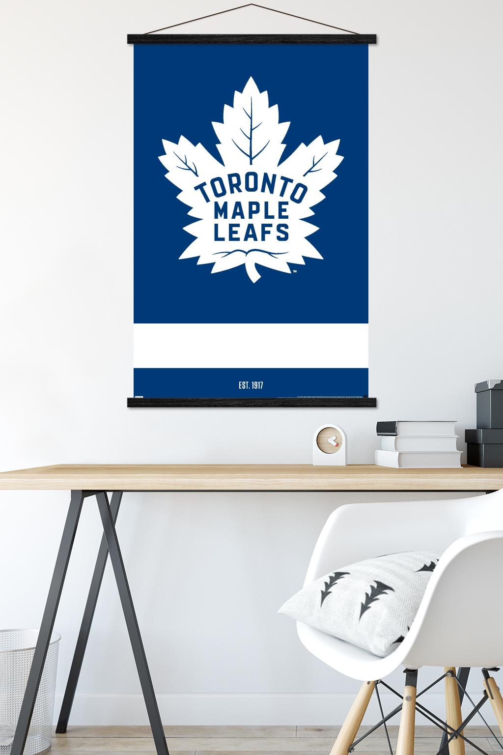 NHL Toronto Maple Leafs - Logo 21 Wall Poster with Wooden Magnetic Frame, 22.375" x 34"