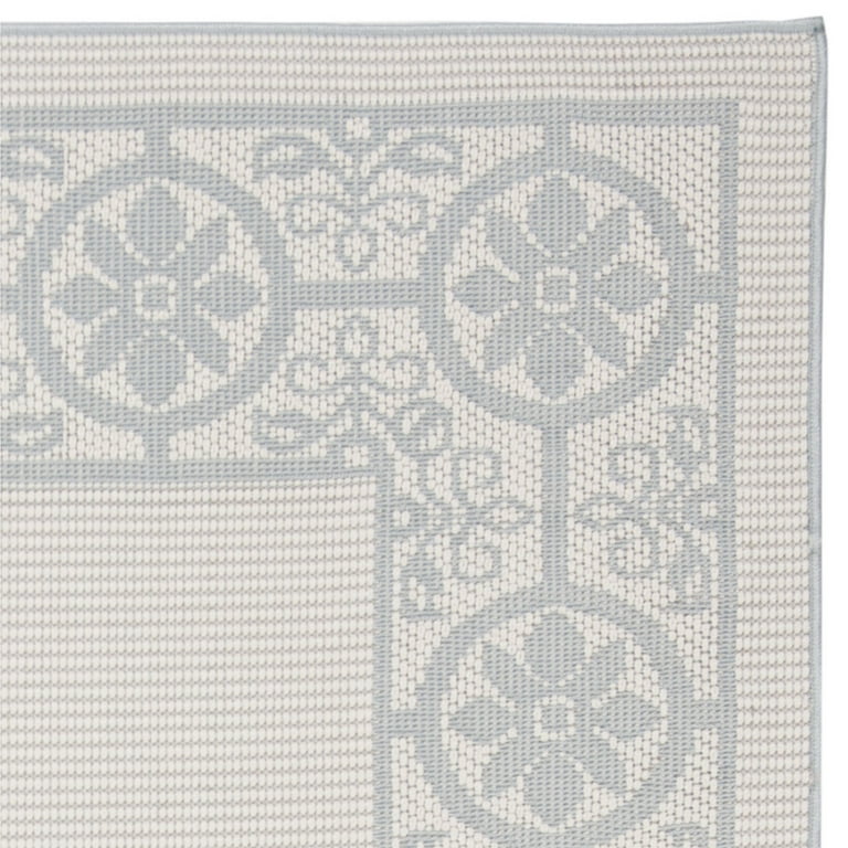 4' X 6' Ivory And Blue Floral Indoor Outdoor Area Rug 4' X 6' Ivory And Blue Floral Indoor Outdoor Area Rug