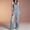 Light Blue, variant on Women Loose Adjustable Strap Denim Ripped Bib Overall Jeans Distressed Wide Leg Baggy Overalls Jumpsuit
