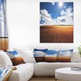thumbnail image 1 of Expansive Field under White Clouds, 1 of 1