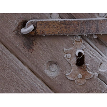 Metal Keyhole And Latch On Rustic Snow Covered Wooden Door Print