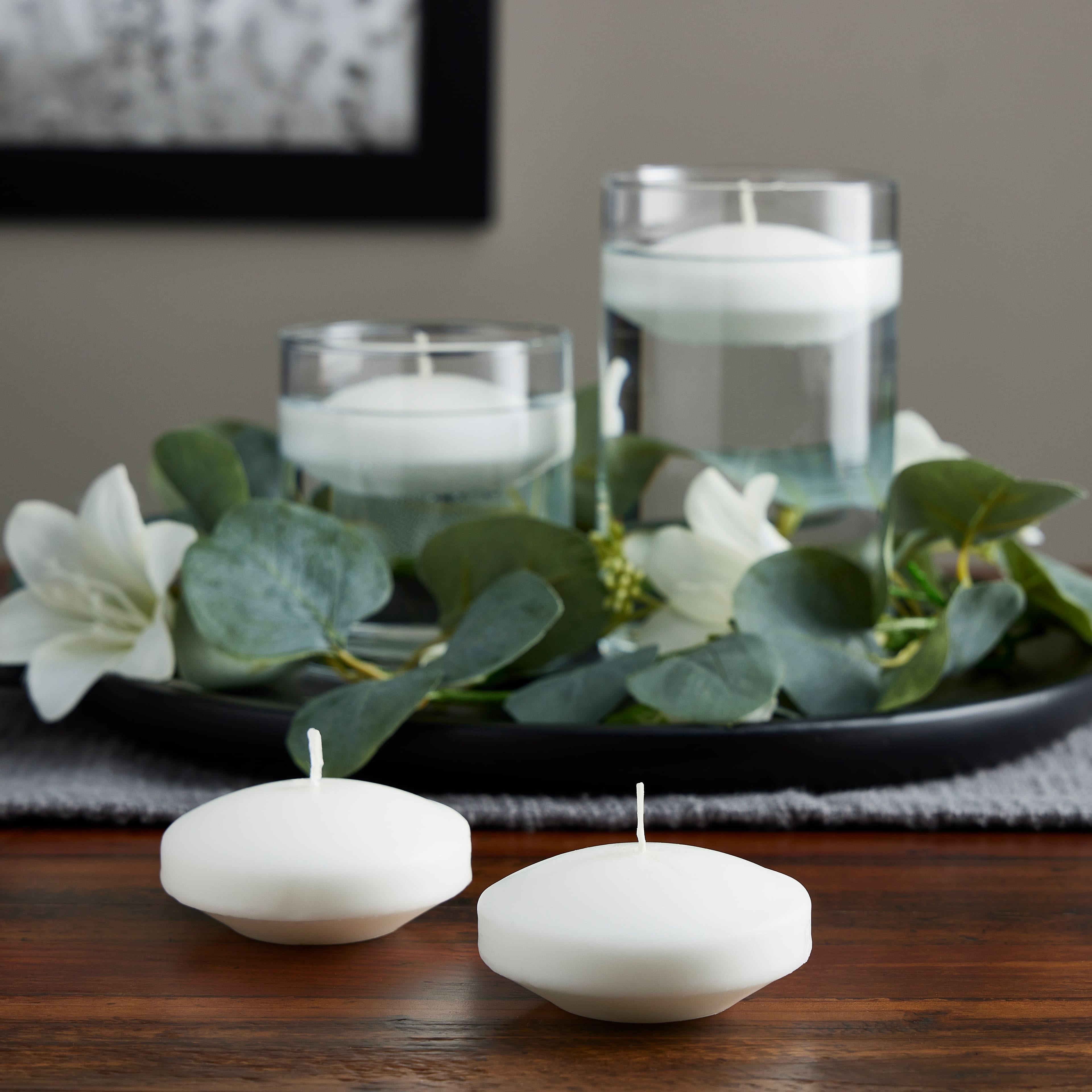 12 Packs: 4 ct. (48 total) Basic Elements™ White Floating Candles by Ashland®  