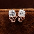 thumbnail image 2 of Women's Rose Gold Skull Stud Earrings - Sparkling Diamond Gothic Jewelry, Pierced Rhinestone Studs for Halloween & Everyday Wear, 2 of 9