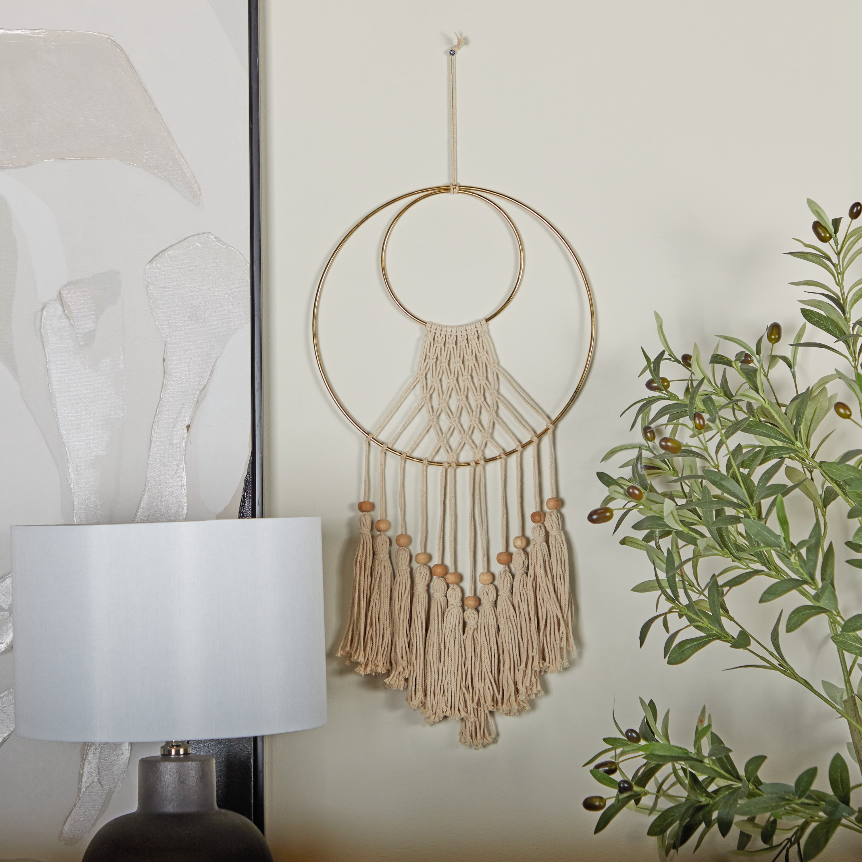 DecMode Cream Cotton Handmade Macrame Wall Decor with Wood Beads and Gold Circular Frame
