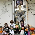 thumbnail image 2 of PMU Halloween Party Accessory Decoration Skeleton Bathroom Door Cover 30in x 60in (3/pkg) Pkg/1, 2 of 6