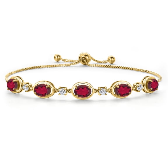 Gem Stone King 18K Yellow Gold Plated Silver Ruby Red Mystic Topaz, Lab Grown Diamond Bracelet for Women | 4.40 Cttw | Gemstone November Birthstone | Oval 7X5MM | Fully Adjustable 9 inch