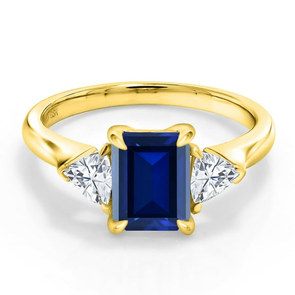 Gem Stone King 18K Yellow Gold Plated Silver Blue Created Sapphire and White Moissanite 3-Stone Ring for Women (1.82 Cttw, 8X6MM Octagon and 3.5 Trillion, Gemstone Birthstone, Size 5)