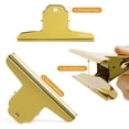 thumbnail image 2 of Pinza Bulldog - 2 uds. Clip de 20 cm de ancho con clip para papel público de oficina (dorado, 5 7/10 pulgadas) TUNC Sencillez, 2 of 4
