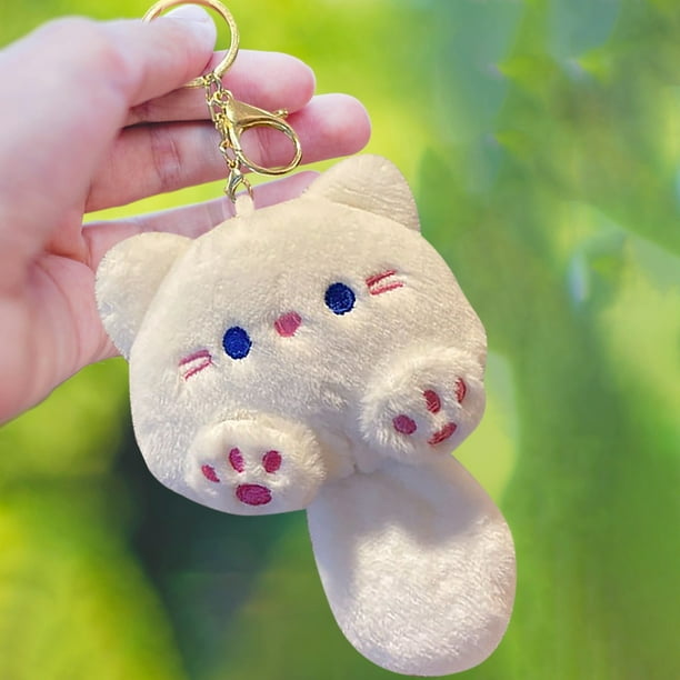 Adorable gatito chirriante de peluche para colgar en el llavero de la máquina