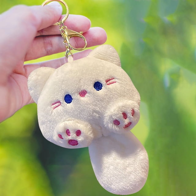 Adorable gatito chirriante de peluche para colgar en el llavero de la máquina