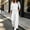 White, variant on Xdegoge Womens 2 Piece Sweatsuits Half Zip Pullover Sweatshirt and Slit Wide Leg Pants Casual Lounge Sets Athletic Tracksuit