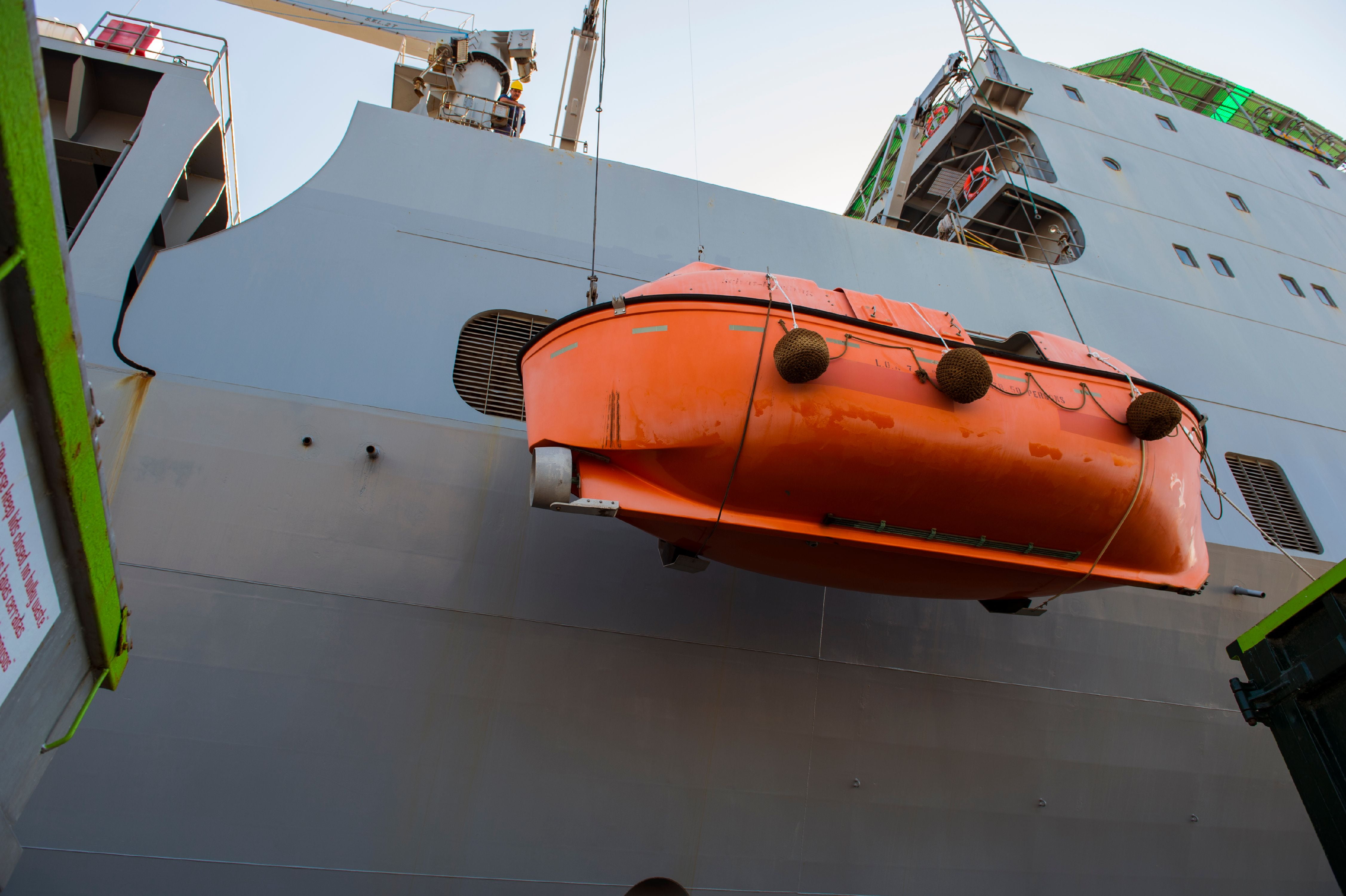LAMINATED POSTER Crew members aboard the rollon/rolloff and container ship MV Cape Ray lower
