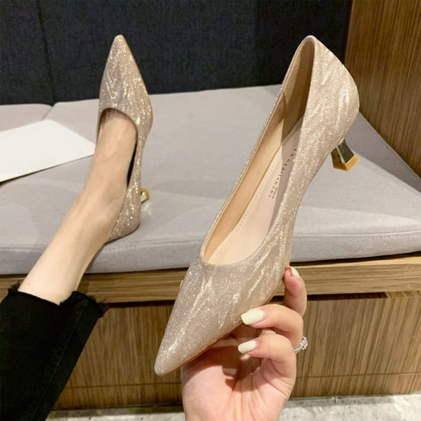 Flat shoes with gold best sale heel