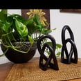 thumbnail image 2 of Stoneage Arts Entwined Love Knot Sculpture 8 Inch Black Hand Carved in Kenya, 2 of 5