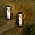 thumbnail image 4 of Elegantes faroles solares colgantes para exteriores, marco de hierro metálico impermeable decorativo para exteriores con luz de vela blanca cálida para un uso versátil en exteriores, 4 of 5