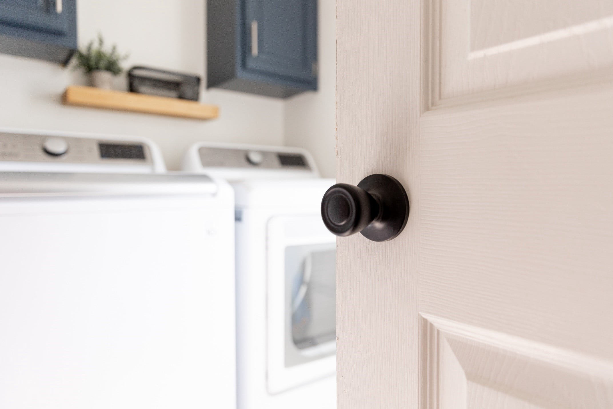 Brinks Non-Locking Passage Tulip Style Doorknob, Matte Black Finish