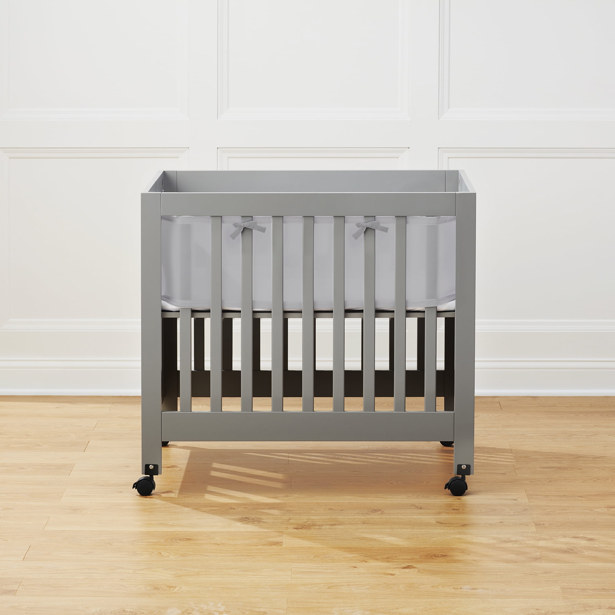 Mini crib cheap bumper walmart