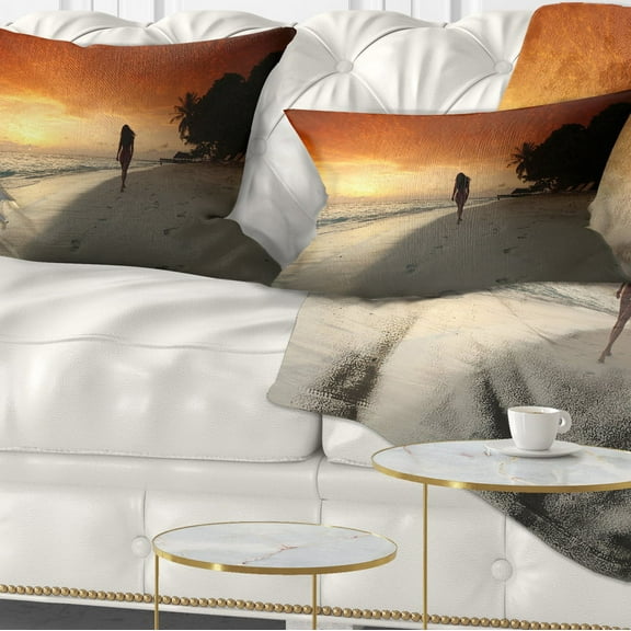 Designart Woman Walking on Beach - Seashore Photo Throw Pillow - 12x20